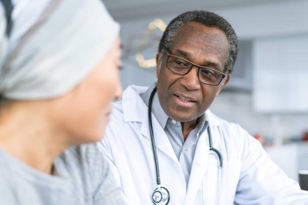 istock Physician consults cancer patient 1175130239
