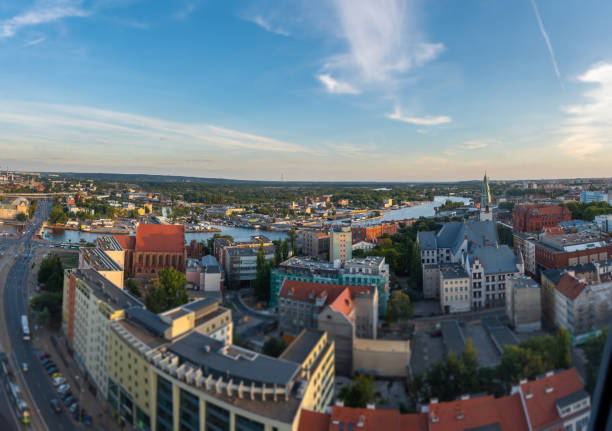 Cityscape with Odra river. Szczecin historical city with architectural layout similar to Paris. Castle of Pomeranian dukes in Szczecin and Basilica of Saint James