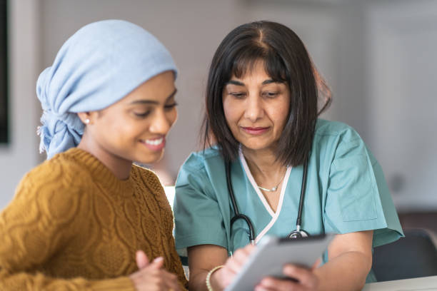 istock Physician consults cancer patient 1175131216