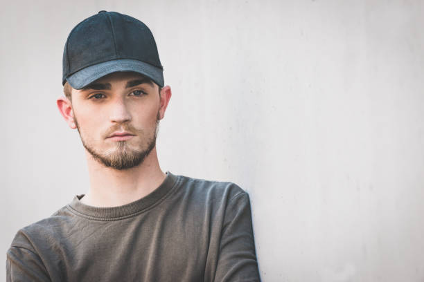 istock Close up portrait of a young bearded man wit cap with copy space for text 1175132684