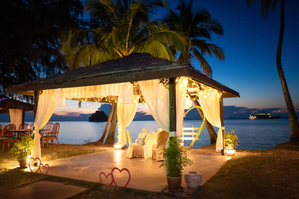 istock Romantic dinner candle light setup on the tropical beach for couple, lovers 1175133556
