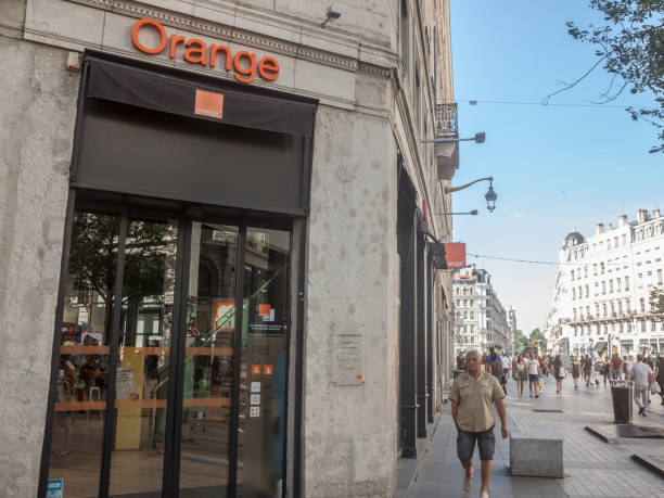 Orange logo in an Orange Shop in downtown Lyon. Orange S.A., formerly France Telecom S.A., is a French multinational telecommunications corporation stock photo
