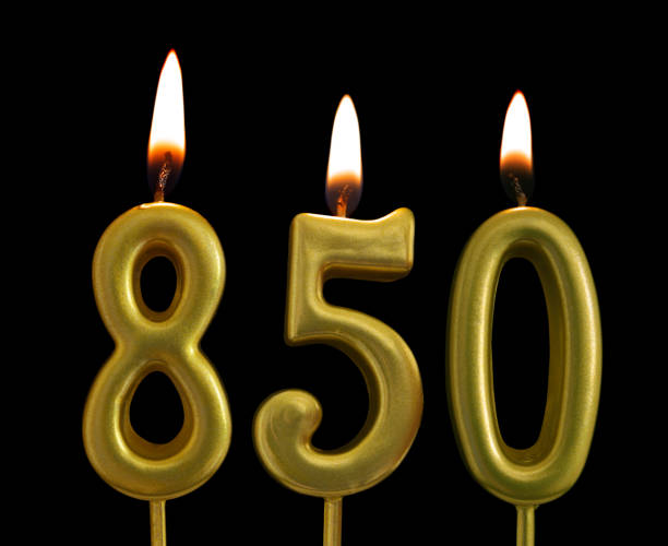 istock Golden birthday candles on black background, number 850 1175146882