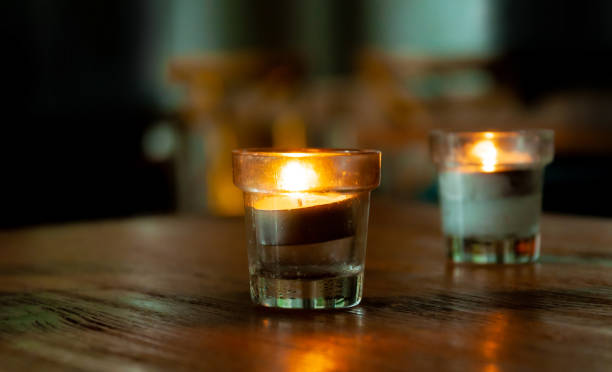 istock Candles in a small glass, candle light night 1175148383