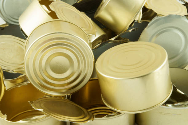 used tin cans background - can dented canned food damaged imagens e fotografias de stock