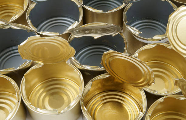 used tin cans background - can dented canned food damaged imagens e fotografias de stock