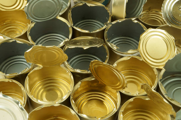 used tin cans background - can dented canned food damaged imagens e fotografias de stock