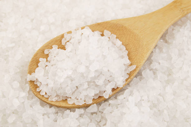 istock Sea salt with wooden spoon 1175150509