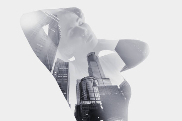 istock Multiple exposure of a woman and multi colored cityscape 1175151334