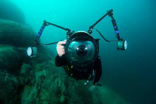 Underwater photographer in cold water.