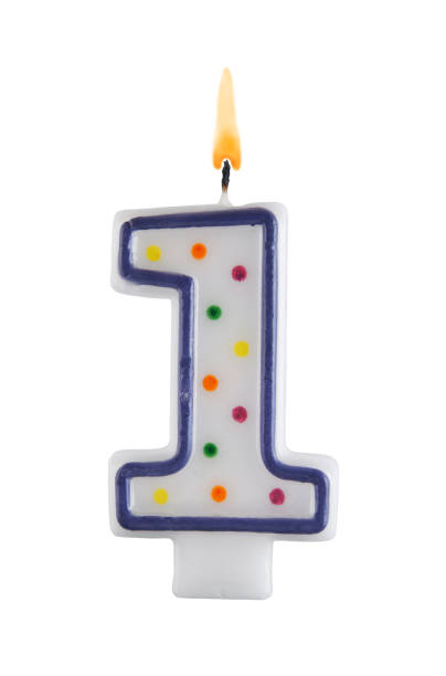 istock Birthday candle on white background, number 1 1175154816