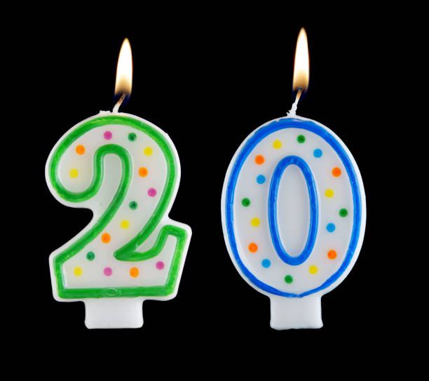 istock Birthday candles on black background, number 20 1175154915