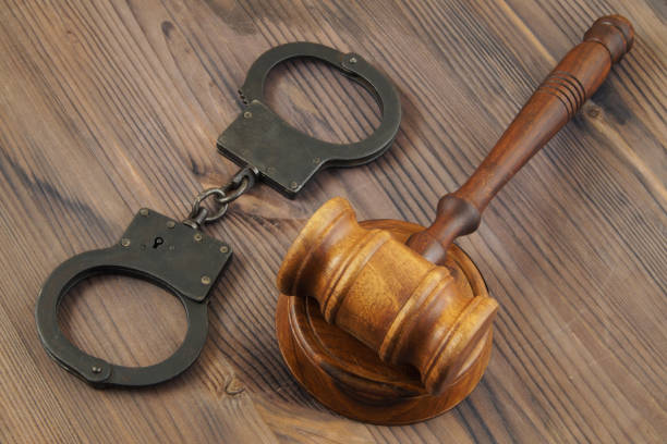 istock Judge gavel and handcuffs 1175158528