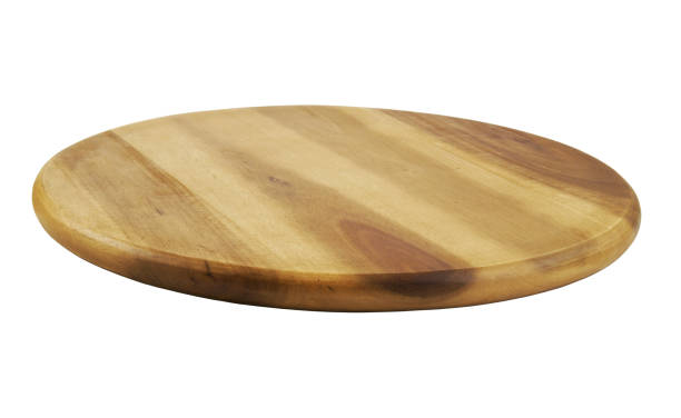 istock Round wooden kitchen board isolated on white 1175160232