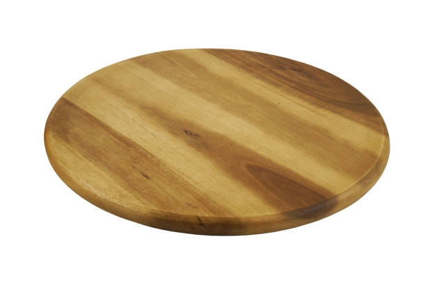 istock Round wooden kitchen board isolated on white 1175160750