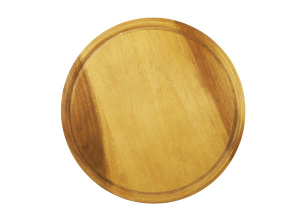 istock Round wooden kitchen board isolated on white 1175160981