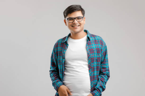 istock Happy young Indian man over white background 1175161559