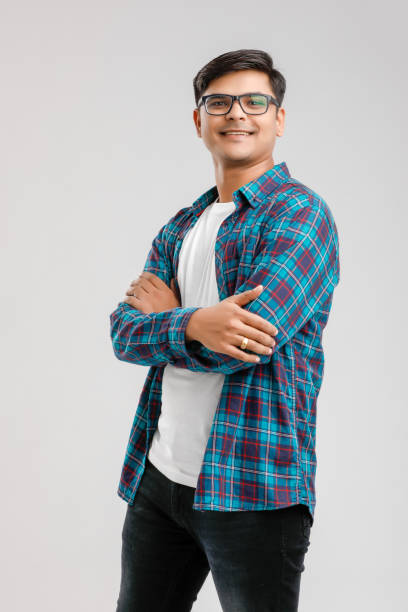 istock Happy young Indian man over white background 1175161581