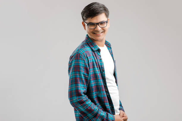 istock Happy young Indian man over white background 1175161646