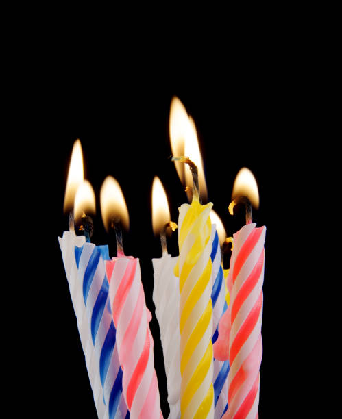 istock Colorful birthday candles on black background 1175163588