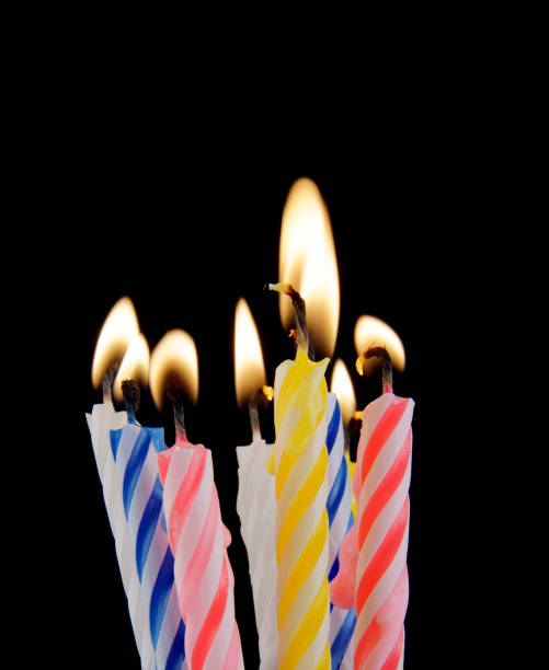 istock Colorful birthday candles on black background 1175163671