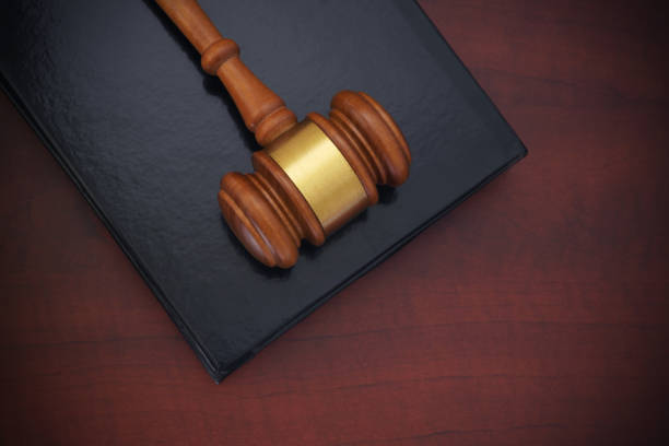 istock Judge gavel and legal book on table 1175164484