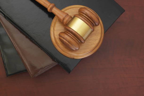 istock Judge gavel and legal books on table 1175164573