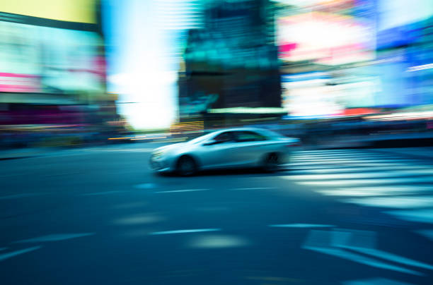 istock Grey car speeding in New York City 1175164596