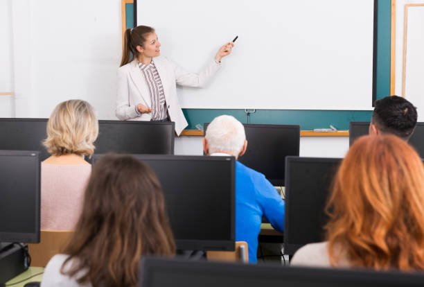 istock Young female trainer giving presentation 1175164599
