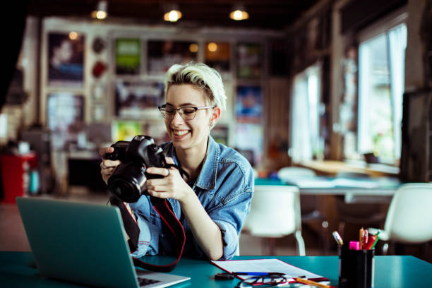 istock Female Photographer 1175174761