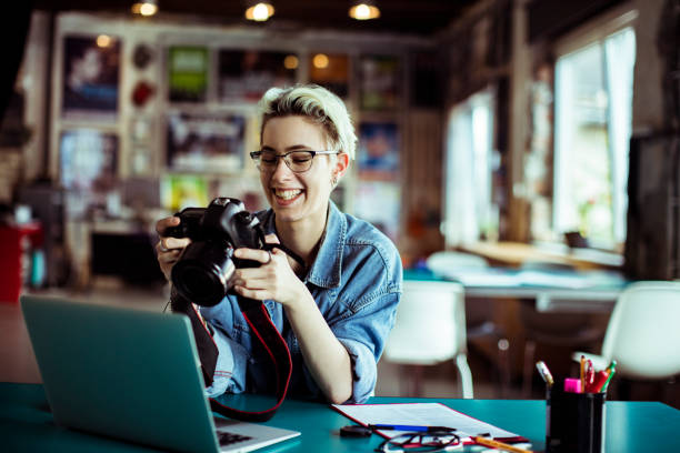 istock Female Photographer 1175176217