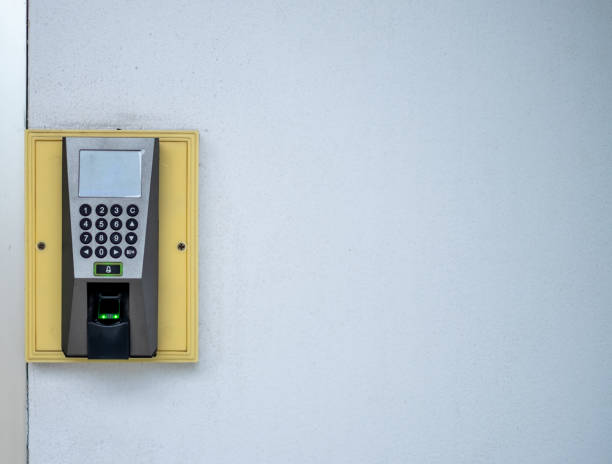 istock A finger scan access control system to lock and unlock doors and The Time Recorder For employees 1175176280