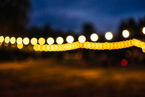 istock Dark background with blurry spots of light. Abstract blur. Bokeh lights blurry. 1175179167