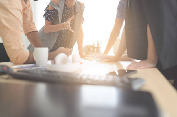 istock Plan a meeting job. In planning meetings. Presenting the plan at a meeting. Put forward a plan at the meeting. 1175179770