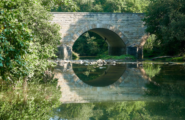 istock Stone bridge crossing the River tauber 1175179884