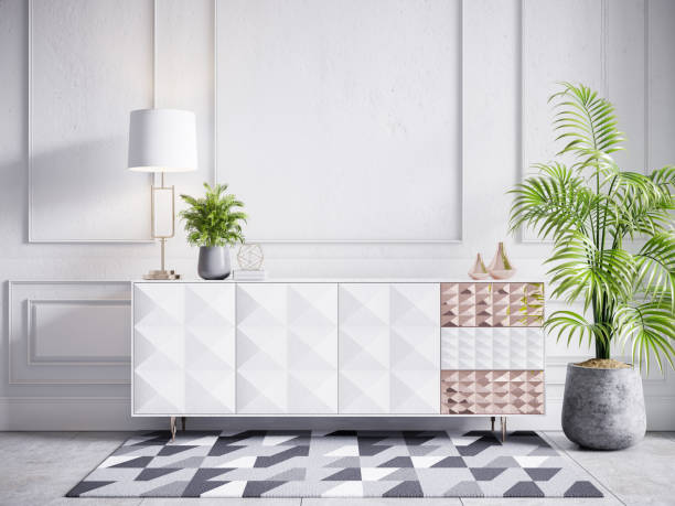 istock White cabinet with plant and gold lamp on white concrete wall ,3D Rendering 1175183090
