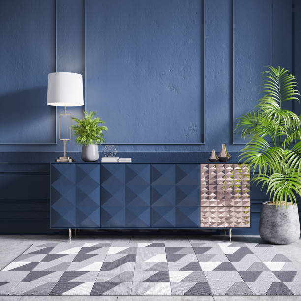istock Blue cabinet with plant and gold lamp on dark blue wall ,3D Rendering 1175183209