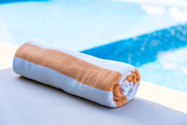 istock Towel on bed around swimming pool in hotel resort 1175186093