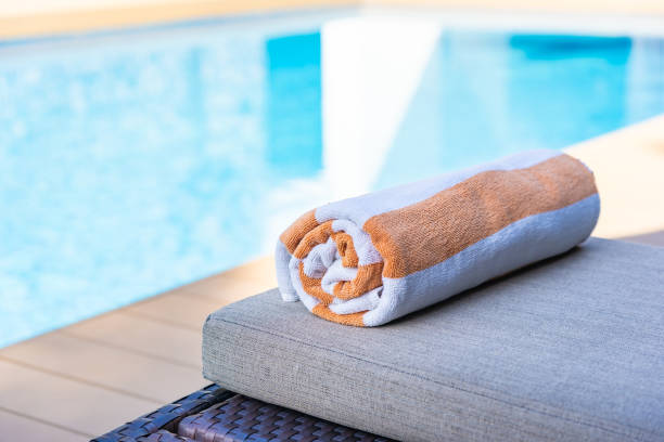 istock Towel on bed around swimming pool in hotel resort 1175186130