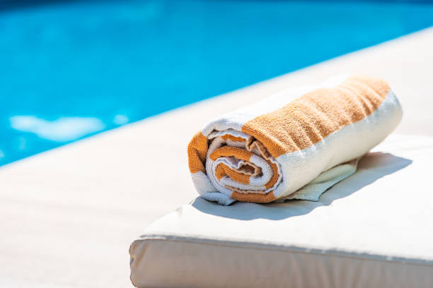 istock Towel on bed around swimming pool in hotel resort 1175186217
