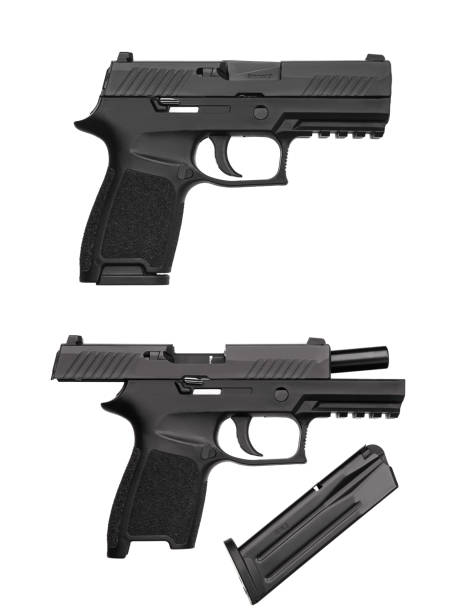 istock Black gun pistol isolated on white background 1175188502