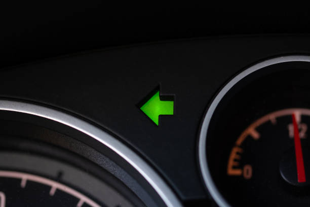 Left turn Car turn signal light, left arrow dashboard close up speedometer odometer stock pictures, royalty-free photos & images