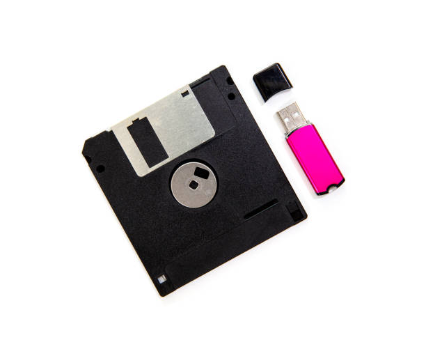 lecteur flash d'usb et disquette d'isolement sur le fond blanc - version 3 flash photos et images de collection