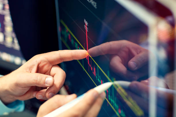istock Online financial analysis on a computer monitor. 1175191104