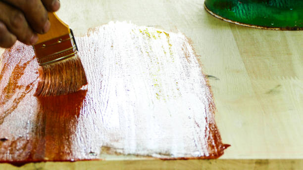 istock Wood painting with a brush 1175192431