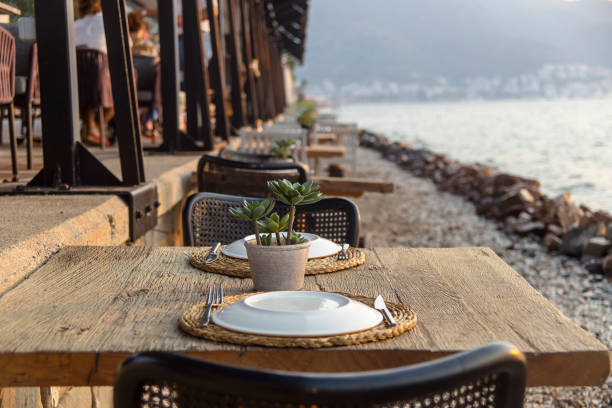 istock Travel table for lunch or dinner by the sea 1175195199