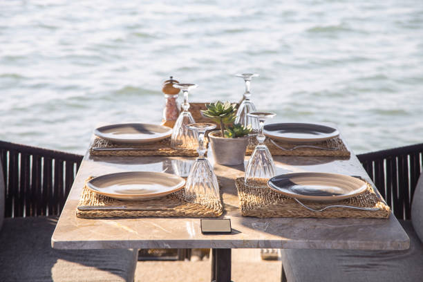 istock Travel table for lunch or dinner by the sea 1175195238