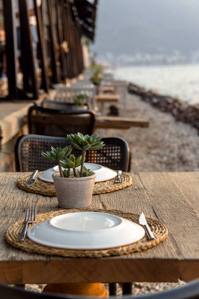 istock Travel table for lunch or dinner by the sea 1175195259