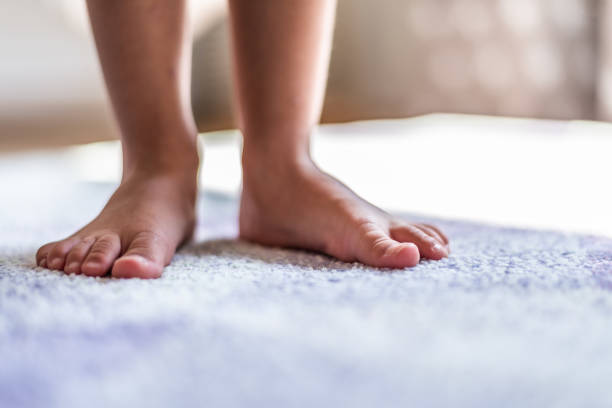 istock Close-up of the small barefoot 1175196291