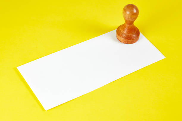 Wooden Stamp On Envelope stock photo